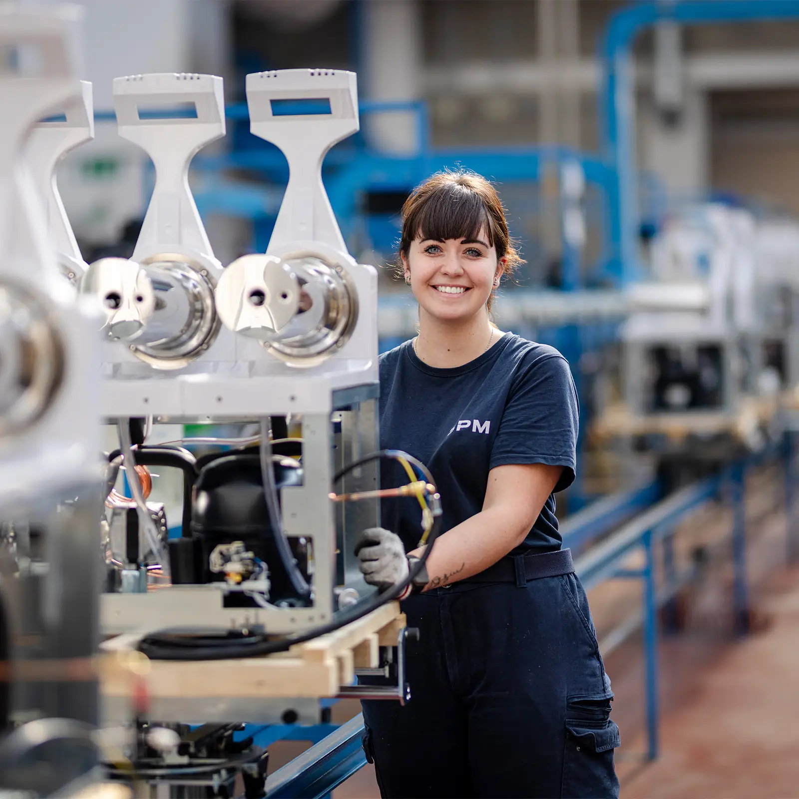 values-woman-works-in-factory-SPM-1600x1200