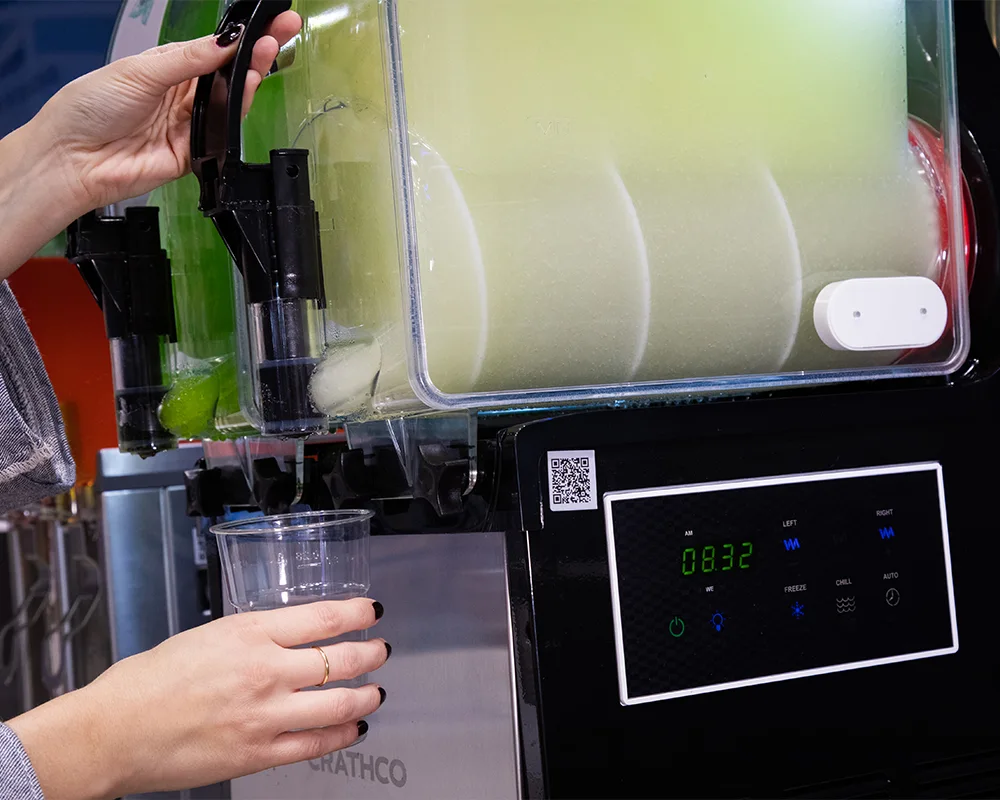 operators-work-with-a-user-friendly-slush-machine-design-SPM-1000x800