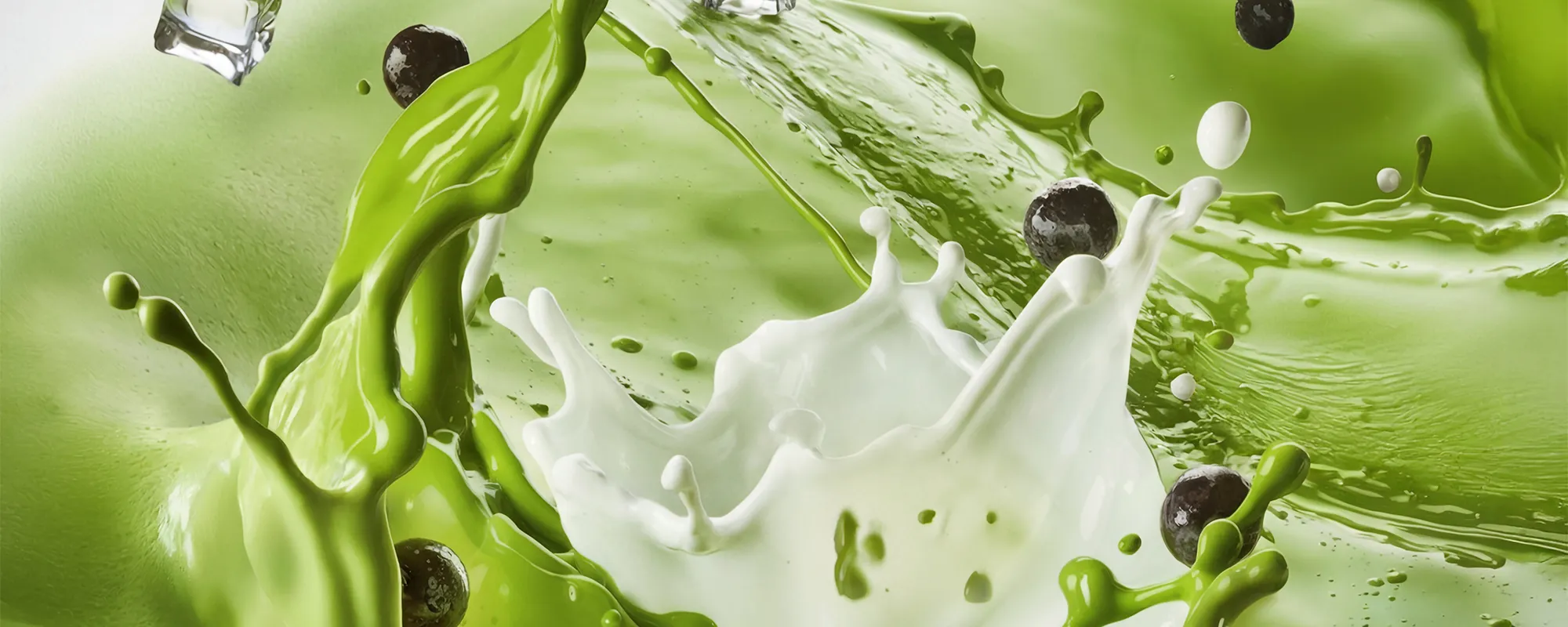 matcha-bubble-tea-with-tapioca-pearls-splash-background-SPM-2000x800